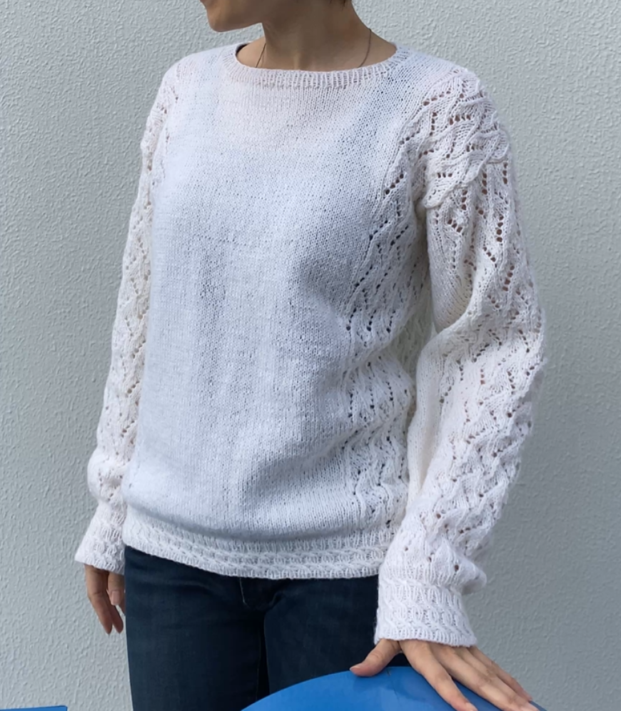 お披露目会で視線が集中した「白いレースセーター」。編み手たちが驚いた、洗練されたディテールとは？