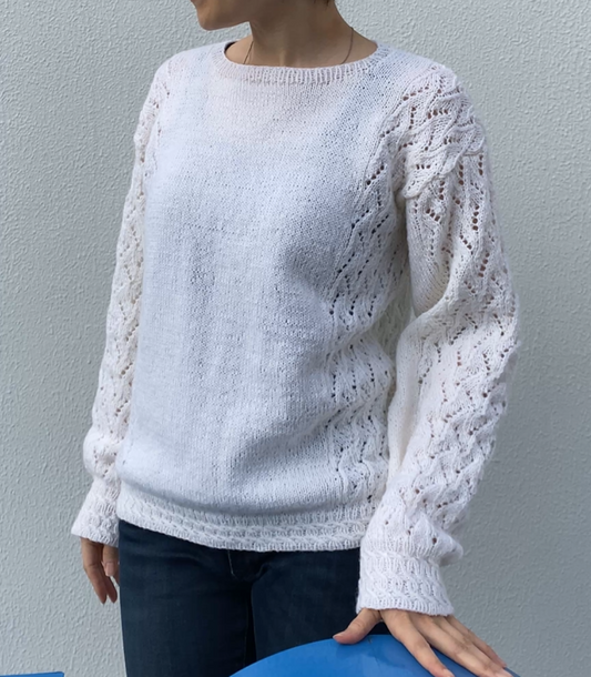 お披露目会で視線が集中した「白いレースセーター」。編み手たちが驚いた、洗練されたディテールとは？